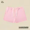 Conjunto de ropa europea y americana para mujer transfronterizo: sudadera casual y shorts, sudadera holgada de forro polar color liso, cuello medio alto, estilo 'dopamine hot girl'