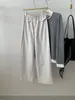 Pantalones finos de secado rápido para otoño temprano con bolsillos falsos para mujer, elegante versión coreana, adelgazantes y versátiles, pantalones rectos de pierna ancha con retazos, nuevo modelo 2026
