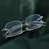 Armazón medio de titanio puro 8185 para mujer estilo ojo de gato ultraligero titanio pluma retro estilo de negocios Shenzhen galvanizado fabricante de gafas Danyang