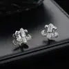 Brincos de Tarraxa Cruzados Flor de Íris Personalidade Masculina Simples Moderno Hip Hop Adornos de Orelha Moda Feminina Leve Luxo Sensação de Alta Qualidade Acessórios