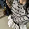 Suéter de punto de punto para mujer de alta gama de otoño nuevo, a rayas vintage, abotonado, cuello puntiagudo, suelto, manga larga, de Dongdaemun, Corea