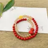 Pulseira de Areia Imperial com Círculo Duplo de Conteúdo Médio Pulseira Dupla de Areia Vermelha Pulseira Multijoia de Areia de Cristal Fonte de Fornecimento ao Vivo Atacado