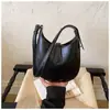 Bolso de gran capacidad, bolso de moda nuevo primavera 2025, elegante bolso de hombro con sensación de alta gama, bolso tote versátil, bolso cruzado de nicho