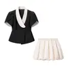 Comercio Exterior Ropa de Mujer 2026 Moda Callejera Europea y Americana Ajuste Delgado Bloques de Color Cuello en V Manga Corta Top + Conjunto de Falda Corta para Mujer C93101