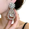 Pendientes de gota de agua incrustados con diamantes transfronterizos europeos y americanos, Pendientes sencillos y de moda, Lujo ligero, Sensación de alta gama, Accesorios para orejas inspirados en el diseño