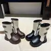 Otoño 2026 Nuevo Estilo Moda Infantil Botas de Cuero a Media Pantorrilla Estilo Coreano Botas de Suela Suave de Princesa Calzado Infantil Botas de Cuero