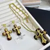 Pendientes de aro con colgante de cruz estilo europeo y americano, collar, pendientes retro de lujo ligero, alta costura, cadena para suéter, moda urbana