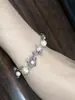 Línea Sentido Flor Perla Moda Todo-partido Exquisito Princesa Lujo Ligero Hueco Industria Pesada Collar Pendientes Pulsera de Sentido Avanzado