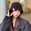 Gorro de lana para mujer, estilo coreano, para otoño e invierno, moderno, combinable con todo, cálido, con protección para las orejas, de punto, para hombre y mujer.