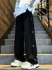 Pantalones casuales estampados estilo americano, nueva colección otoño/invierno, ropa deportiva de moda, pantalones versátiles de corte recto holgado para hombre