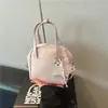 Bolso Retro de Textura Novedosa Pequeño Bolso Tote para Mujer Primavera 2026 Nuevo Bolso Simple Tipo Concha Bolso de Hombro Cruzado