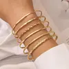 Moda europeia e americana nova personalidade moda em relevo torção geométrica multicamadas empilhadas pulseira conjunto de 10 peças de decorações atacado
