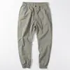 Pantalones de verano para hombre, finos, sencillos, atados al tobillo, holgados, casuales, marca de moda, elásticos, seda helada, secado rápido, pantalones deportivos para hombre