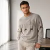 Fábrica de suéteres de punto para hombre de moda transfronterizos de alta venta, no hace bolitas, de cuello alto medio Ropa de punto para hombre