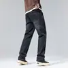 Moda popular para hombre / Nueva colección Primavera/Otoño 2026: pantalones de mezclilla elásticos para hombre, tiro medio a alto, ligeros, estilo casual de negocios, corte ajustado, versátiles
