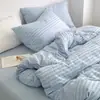 Juego de cuatro piezas de algodón seersucker blanco puro lavado para hotel B&B Clase A, funda de edredón 100% algodón, sábana y sábana bajera