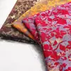 Tela de terciopelo estilo nacional para ropa, tela jacquard de chenilla, tops y chaquetas de chaleco para otoño e invierno, material de confección, fabricante