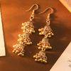 Pendientes de estilo étnico bohemios de tres capas con borlas y campana hueca, de gran oferta transfronteriza entre Europa y América, para mujer.