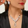 Conjunto de quatro peças de colar de figura de oito cravejado de diamantes transfronteiriço, acessórios de joias da moda para vestidos de banquete, fornecimento em atacado