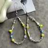 Colgante original de flor de limón de verano cadena para teléfono ins charm de cámara ccd fresco correa de muñeca para bolsa anti-pérdida con cuentas