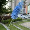 Nueva fábrica de delphinium delphinium mediano rojo rosa violeta salón de bodas Camino plomo flores artificiales suaves al por mayor