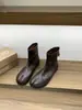 Zapatos de pezuña de cerdo con punta dividida y fondo plano botas de tobillo negras botas para mujer 2026 adelgazantes marrones con faldas primavera y otoño botas sencillas