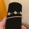 Pulseira Aberta Dupla Camada com Laço de Zircônia Gota d'Água Estilo Super Brilhante de Luxo Leve Joia de Mão Elegante de Alto Padrão Nicho Europeu e Americano para Mulheres