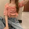 Verano nuevo retro elegante adelgazante suéter corto con cordón para mujer diseño casual top de manga corta