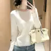 Suéter de punto abierto de manga larga de color liso para mujer de principios de otoño, una capa base ligera y elegante con efecto adelgazante, estilo coreano y un top chic