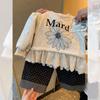 Sudadera de terciopelo para niñas color crema estilo coreano dulce nuevo estilo 2025 niña pequeña bebé todo en uno top de terciopelo ropa de invierno moderna