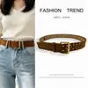 Cinturón texturizado simple y versátil para mujer, diseño clásico de hebilla de pasador, adecuado para trajes casuales y jeans, versátil y con sensación de alta gama