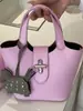 Bolso de mano texturizado simple nuevo de nicho transfronterizo 2026, bolso tote pequeño, bolso tipo cubo, bolso de hombro y cruzado, bolso de mujer de moda