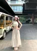 Conjunto de Dos Piezas para Mujer: Chaleco Exquisito de Diseño Francés sin Mangas y Falda Larga Ajustada, Nuevo Estilo de Verano