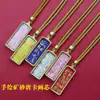 Venta al por mayor del fabricante Arena Mineral Pintada a Mano Acero de Titanio Thangka Zaki Lamu Amarillo Riqueza Mineral Pequeño Thangka Portátil Buda Amuleto Colgante Collar