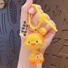 Criativo dos desenhos animados dinheiro maneira um pequeno pato amarelo chaveiro pingente casal mochila chaveiro pingente pequeno presente atacado