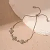Pulsera Flor de Circonita Chapada en Oro Real Nicho Dulce Versátil Pulsera Temperamento Lujo Ligero Joyería de Gama Alta para Mujeres Al Por Mayor