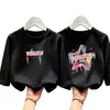 Camiseta de manga larga de algodón puro para niñas lindas, nuevo estilo primavera y otoño 2026, top infantil estiloso, camiseta básica casual para niños mayores