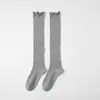 Calcetines de canalé verticales adelgazantes para pantorrilla combinados con botas, estilo JK japonés puro y deseable, calcetines holgados de algodón con encaje para primavera y otoño para mujer