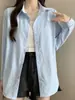 Camisa blanca protectora del sol con un diseño único, chaqueta de camisa de manga larga chic petite estilo francés