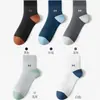 Calcetines Zhuji para hombre, verano, malla fina, transpirables, color liso, calcetines de tubo, absorben la humedad, calcetines casuales de verano para hombre