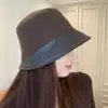 Sombrero de pescador retro estilo vintage para mujer, de cuero PU patchwork, para otoño e invierno, sombrero tipo cubo elegante y que adelgaza la cara
