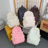 Mochila floral minimalista estilo bosque 2026 conjunto de tres piezas estilo campus transfronterizo mochila escolar para estudiantes de secundaria y preparatoria mochila de viaje