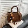 Bolso cruzado para ir al trabajo para mujer 2025 Nuevo estilo Bolso de mano de moda Bolso cuadrado pequeño retro casual para hombro