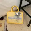 Bolsa Feminina Texturizada de Nicho 2026 Verão Nova Tendência Bolsa de Mão Estrela Bolsa Tote Color Block de Bolinhas