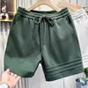 Pantalones cortos para hombre, pantalones de longitud media para el verano 2026, marca de moda, transpirables, holgados, finos, pantalones casuales de cintura media para hombre