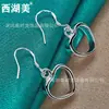 Aretes de plata huecos en forma de corazón joyería femenina joyería belleza del Lago Oeste