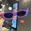 Gafas de sol de ojo de gato con montura pequeña transfronterizas gafas de sol para fotografía show de gafas de sol compras genial anti-ultravioleta moda europea y americana niños nuevo