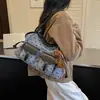 Nova bolsa tote estampada de leopardo outono/inverno para mulheres, novo estilo 2026, com bolsos duplos, moderna e versátil, perfeita para um look chique, retrô e apropriado para o trabalho