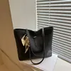 Bolso de hombro tipo tote de gran capacidad para el trabajo, nueva tendencia casual de primavera 2026, bolso de hombro diario texturizado para mujer