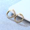 Comercio exterior nuevo hebilla de oreja de acero inoxidable con diamante de oro de 18 quilates tendencia moda micro circonita acero de titanio aretes al por mayor